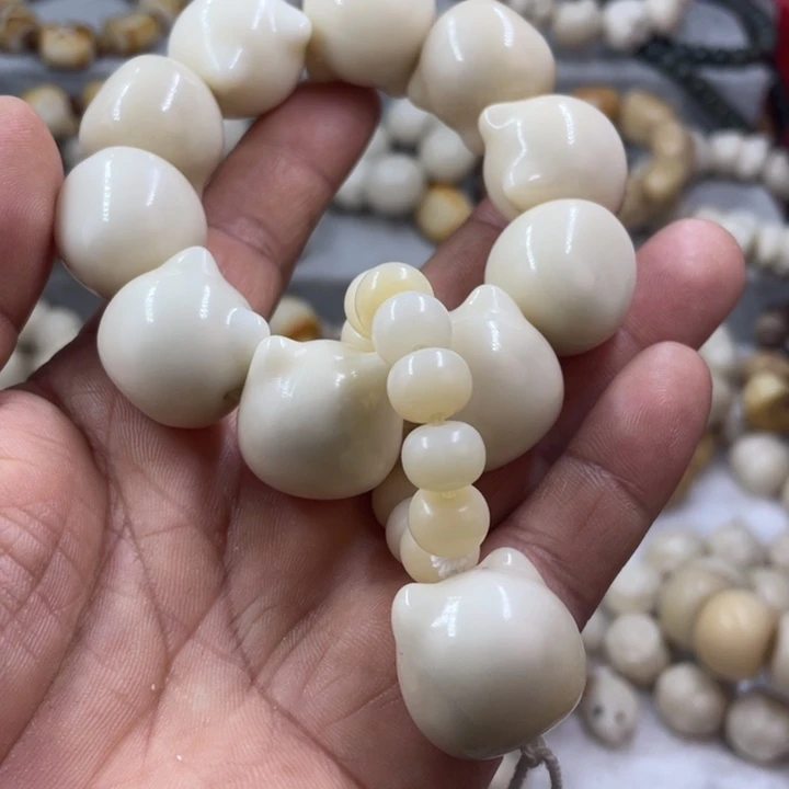 吊坠菩提根/象牙果全品象牙果猫头手串卡21