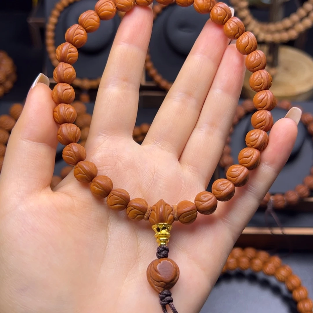 秦***超桃核手串野生玉龙脊10