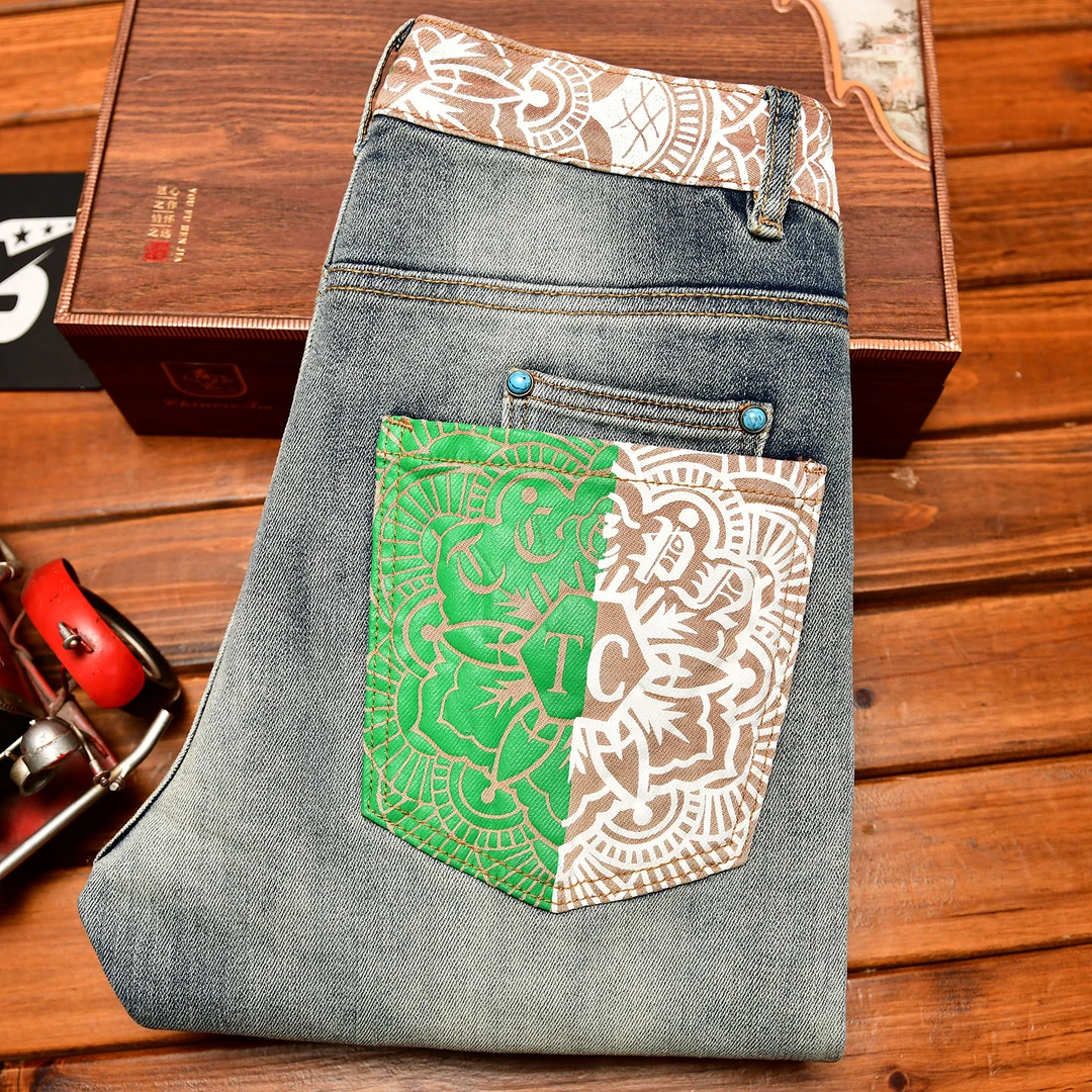 高端弹力印花牛仔裤男款时尚破洞补丁修身小脚裤潮流韩版弹力长裤