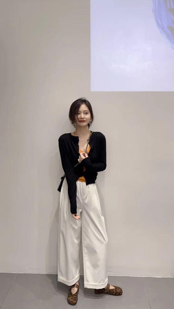 2025秋季新款韩系简约黑色长袖针织衫橘色挂脖背心百搭休闲裤套装