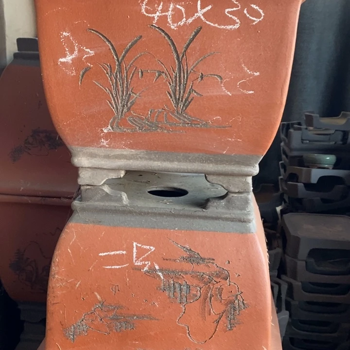 花盆紫砂只顾看手机的小