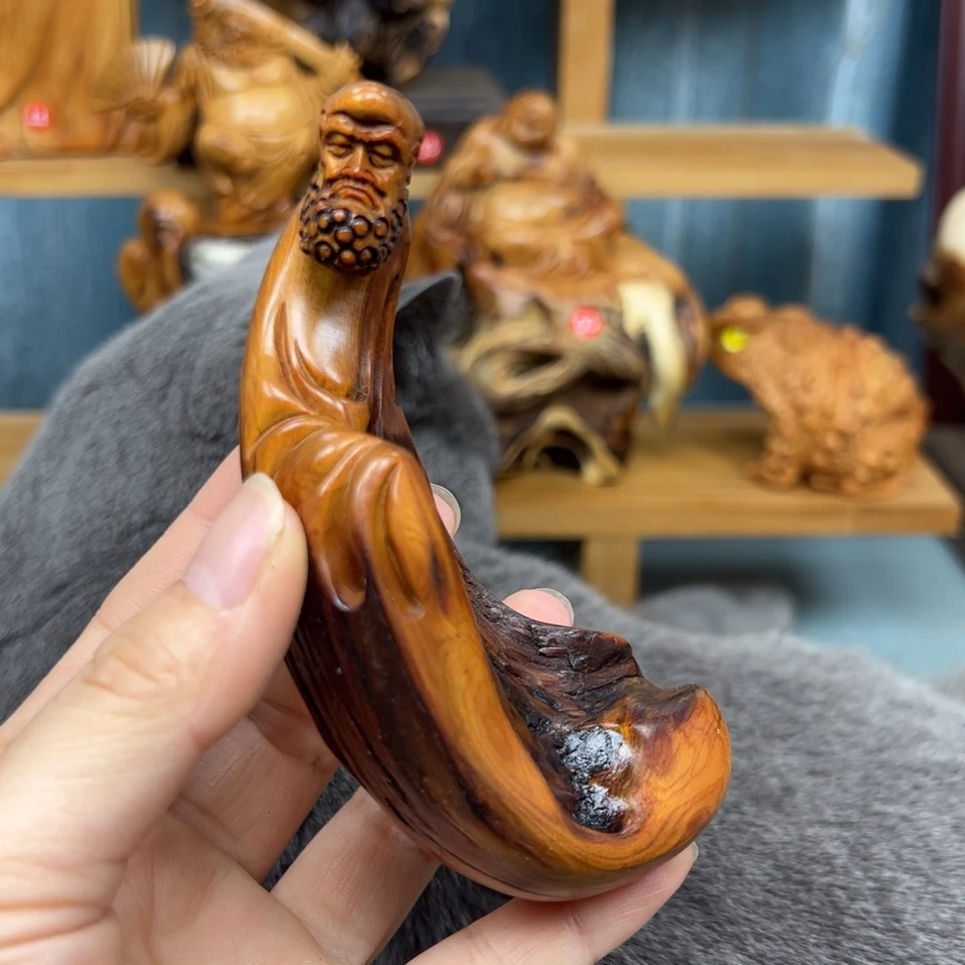 木裤**了崖柏木摆件手把件