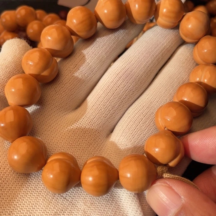 ****石猴头核桃手串屁桃