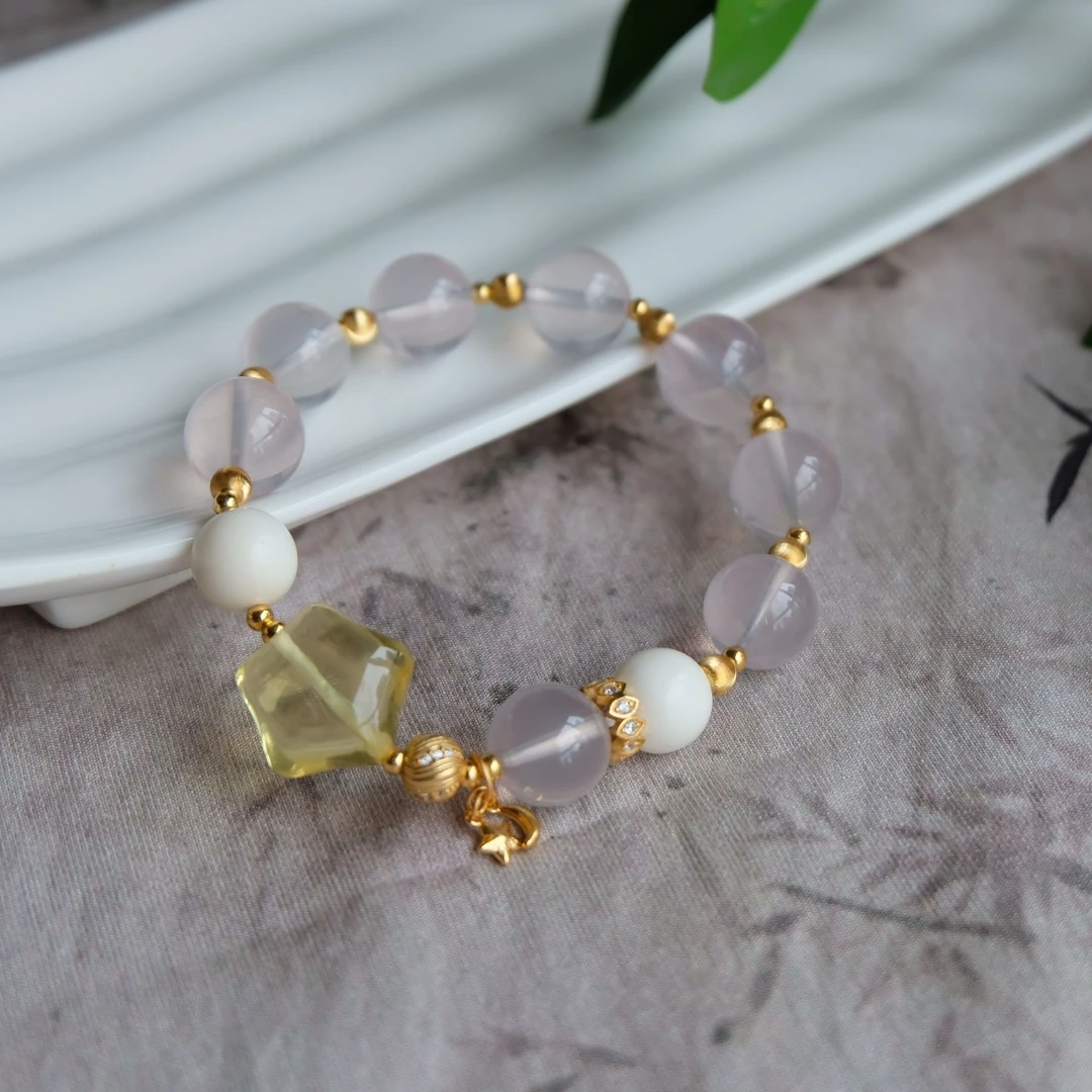 莫桑比克粉水晶蜜蜡牙牙手串