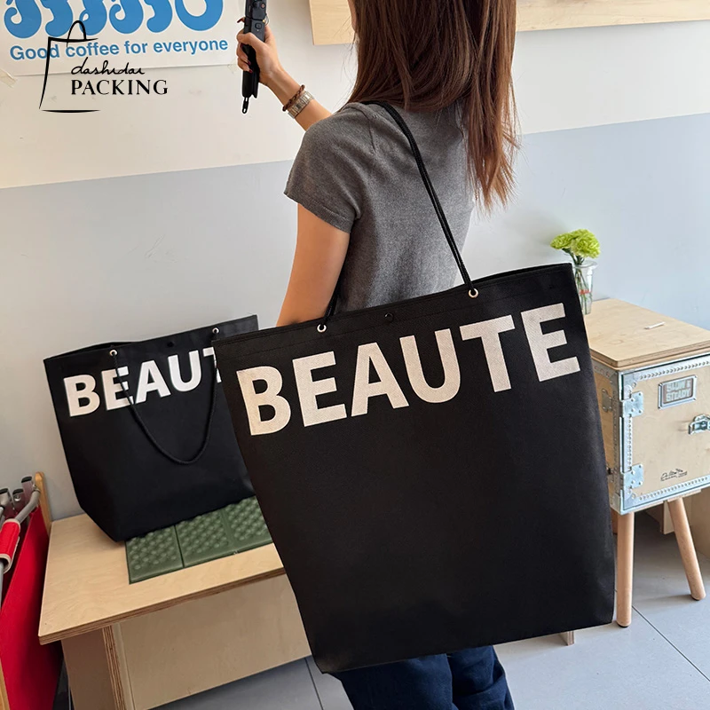 穿孔无纺布手提袋子服装店大容量包装袋购物袋黑色礼品礼物袋定制