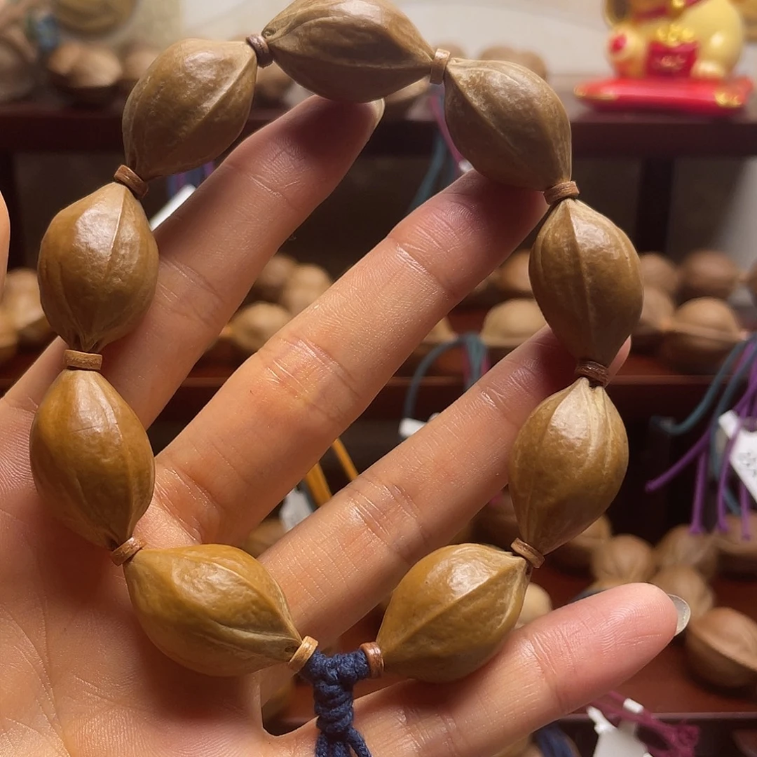 ****物橄榄核手串梅林铁核1727