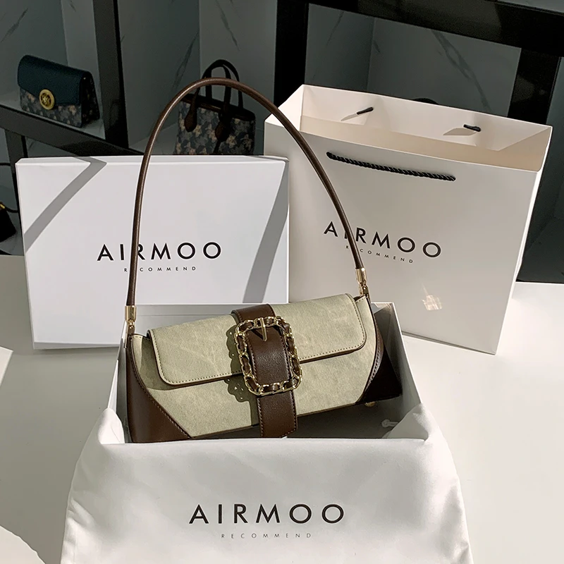 AIRMOO/艾姆轻奢真皮包包女士小众通勤腋下包时尚百搭法棍单肩包