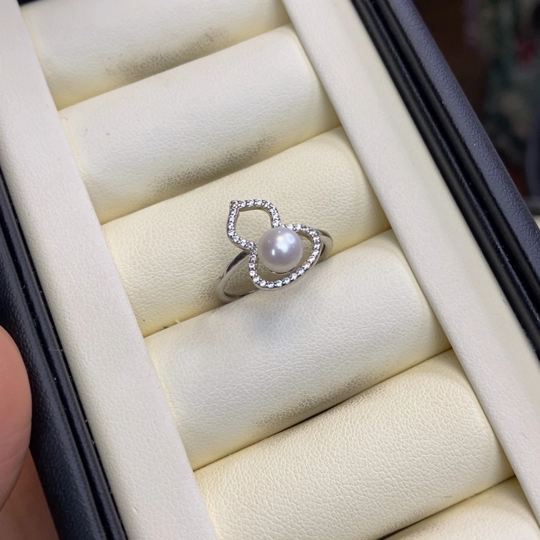 执***着淡水珍珠银S925镶嵌戒指微瑕