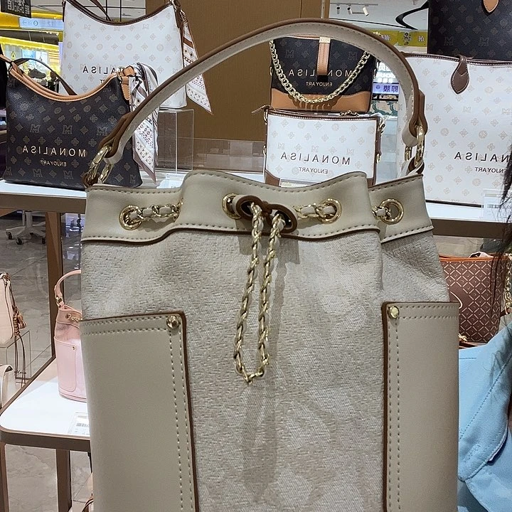 牦牛剖层皮革水桶包女包手提