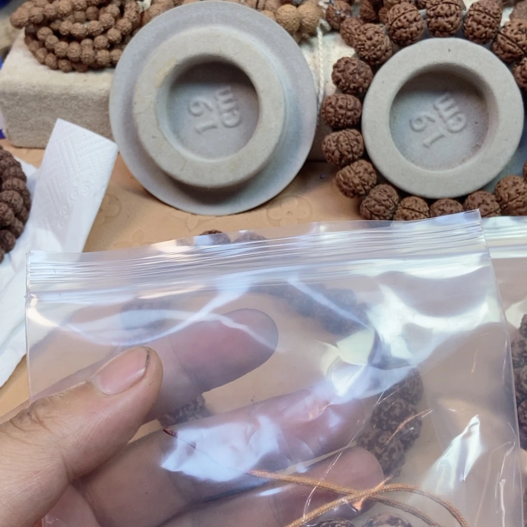 金刚菩提吊坠?**丁福利纽扣手持