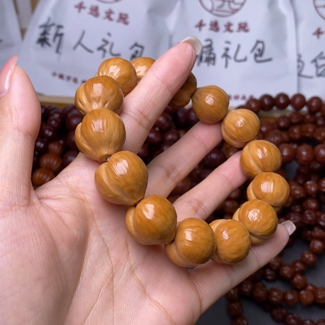 @***傅猴头核桃手串屁桃