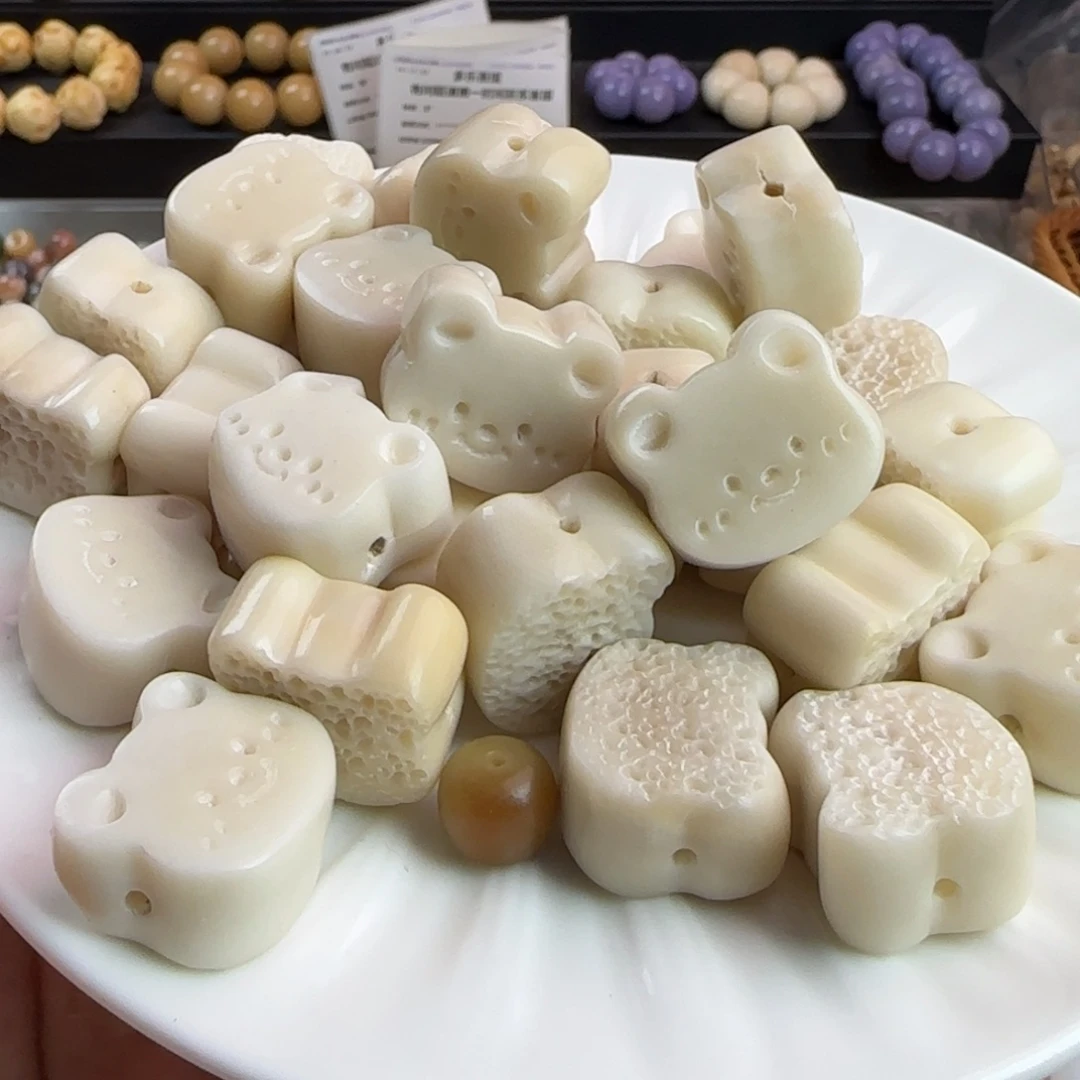 菩提根/象牙果手串微瑕疵熊头饼10颗