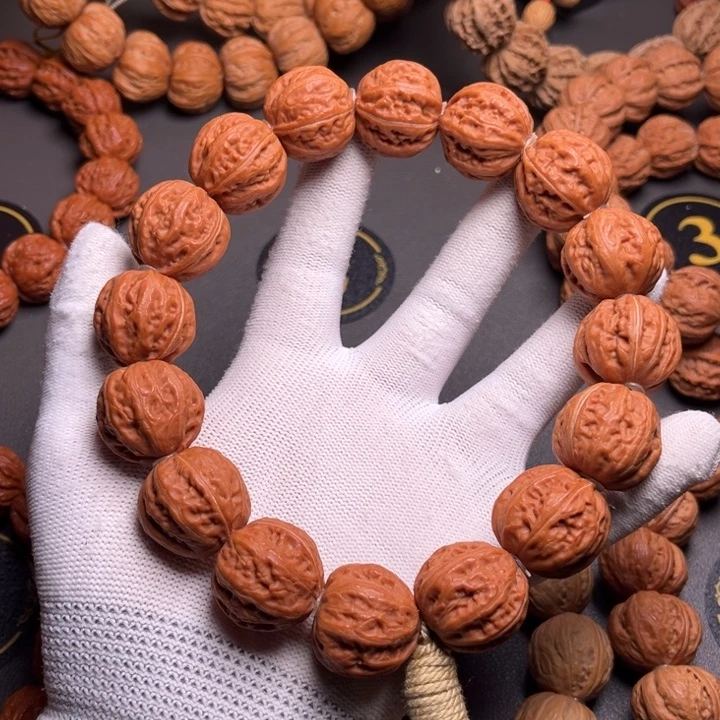 阿***钱文玩核桃手串京八棱