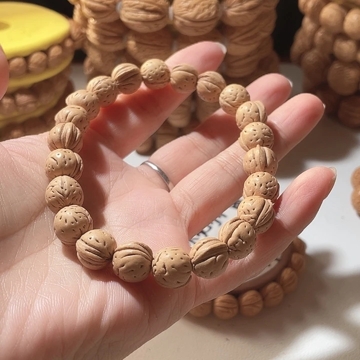 z***y吊坠桃核桃核手串野生。6