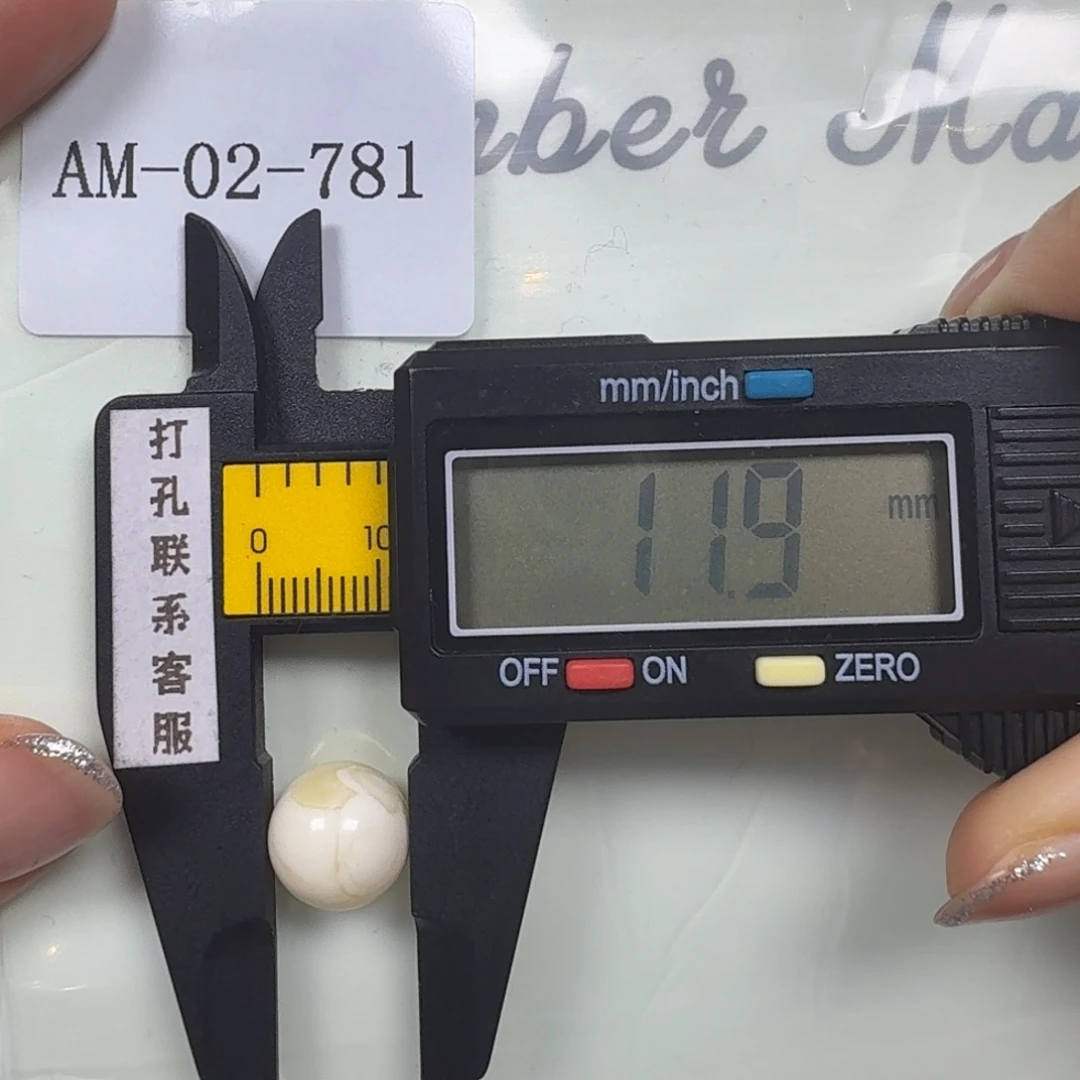 愚***_蜜蜡未镶嵌珠宝奇石微瑕打孔不退换