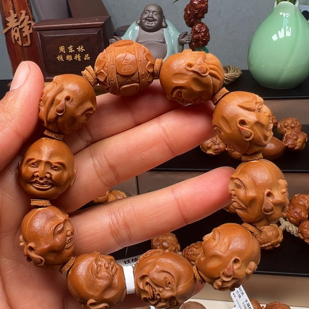 橄榄核吊坠罗汉手串