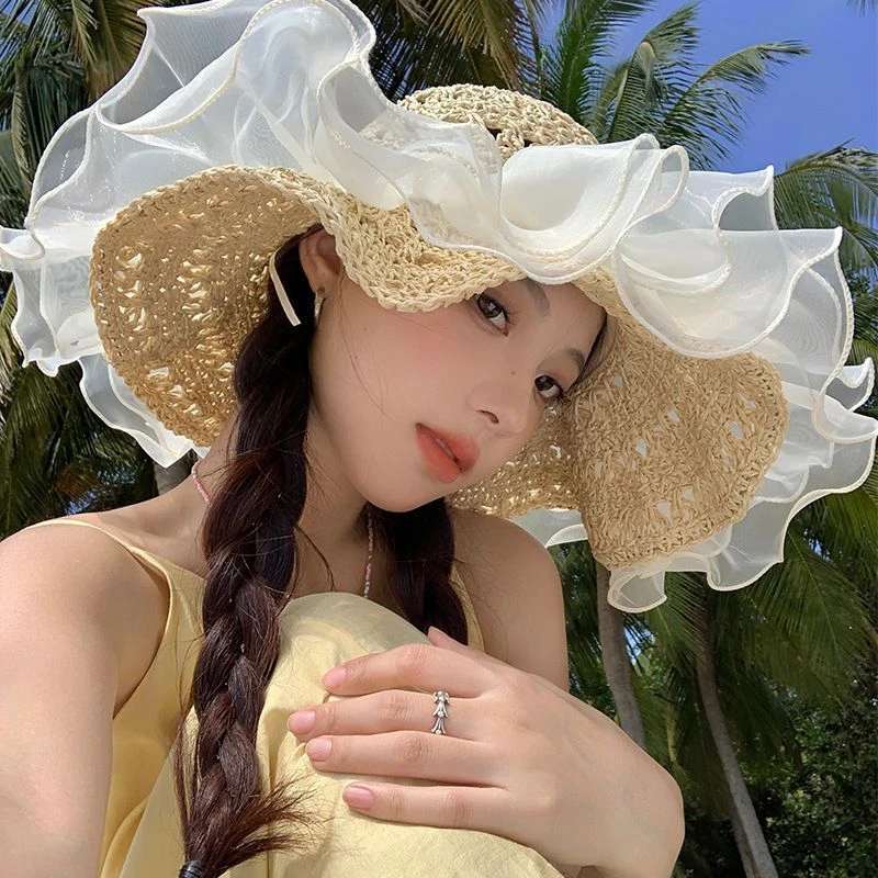 草帽女2025新款夏季镂空草编帽出游防晒帽子沙滩海边大帽檐遮阳帽