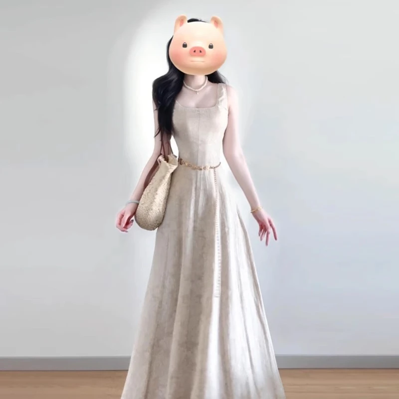 1089法式茶歇吊带连衣裙子女春季新款气质高级感纯欲收腰显瘦长裙