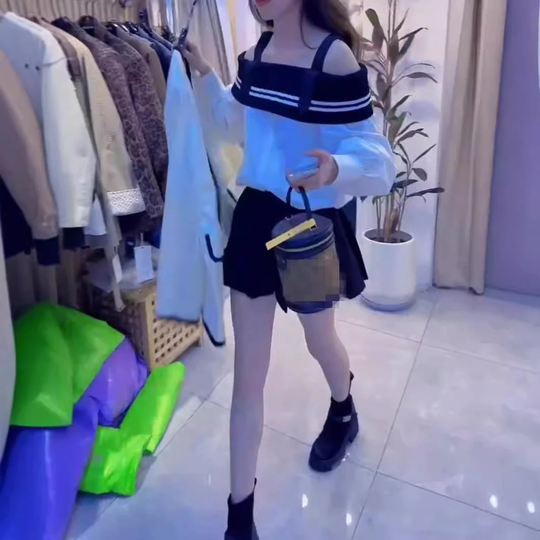 24959大爱美依缘2025新款纯欲风一字肩长袖上衣百褶短裙洋气女潮