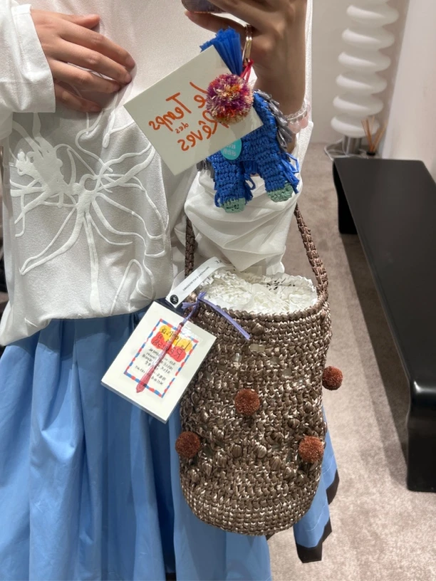 颂的鹤咖色编织包