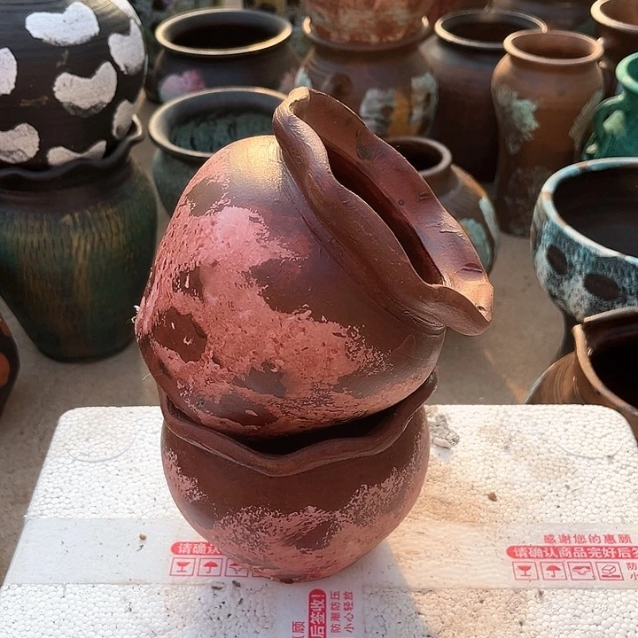 一对微瑕红陶高度11口径9带孔