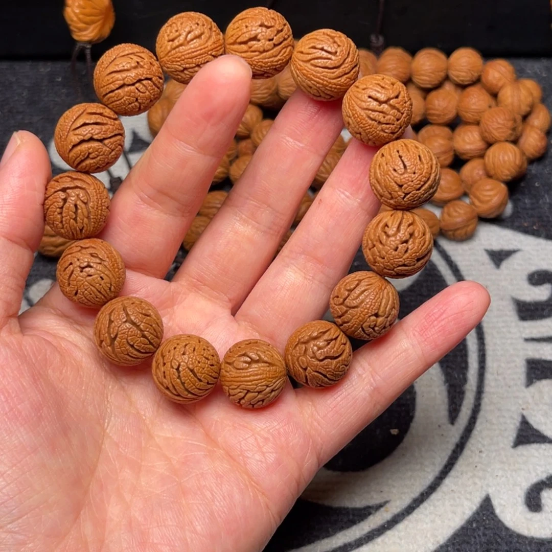 桃核手串龙纹绣球16