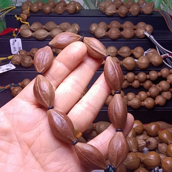 橄榄核手串/手链橄榄核手串三花铁核紫皮料微瑕疵1.5