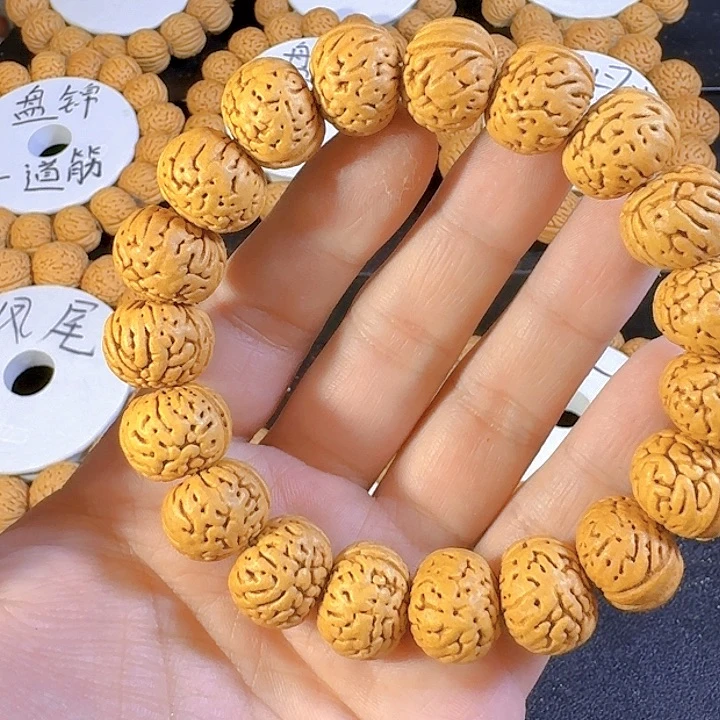 滨***滨桃核吊坠纽扣桃核手串