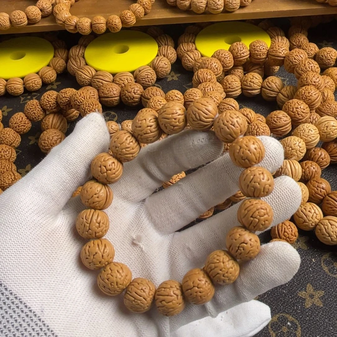 1***5桃核手串肉纹元宝