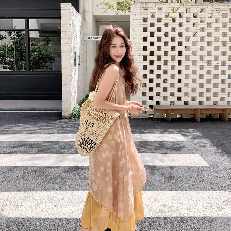 法式波点不规则拼接吊带裙女2025夏季新款氛围感南法度假风连衣裙