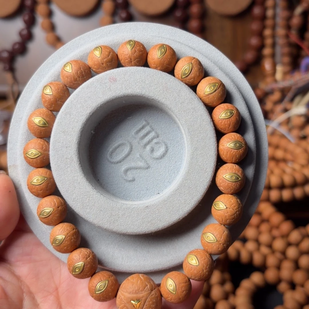 凤眼菩提手串镶嵌法螺眼