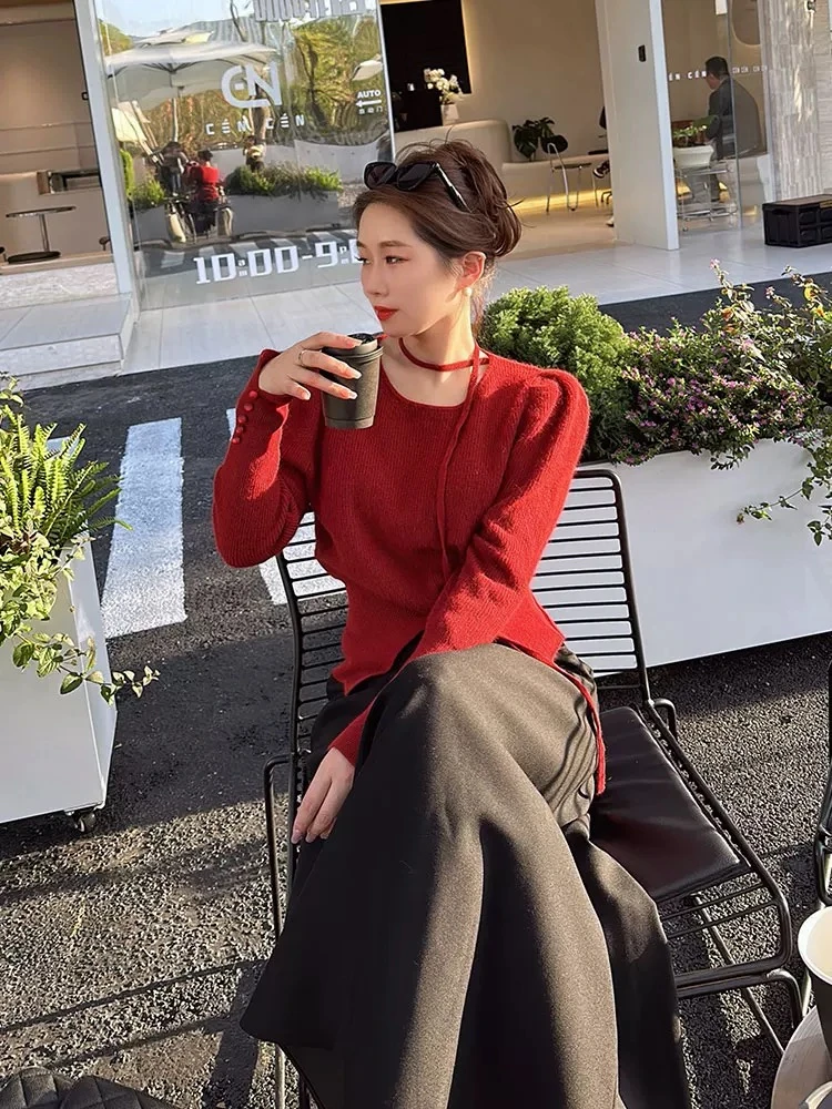 新年红色高级感针织衫女春秋冬2025年新款设计感上衣开叉短款毛衣