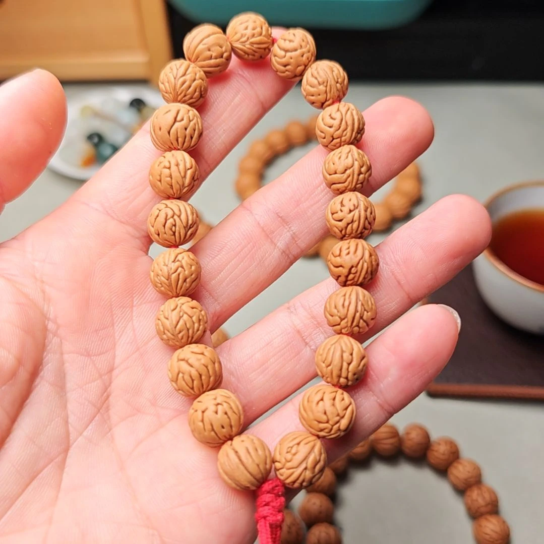 辉***桃核吊坠大肠纹桃核手串