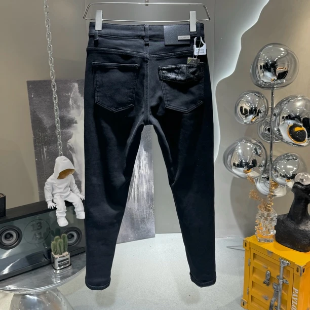 欧美简约常规款牛仔裤微锥百搭时尚黑色打底显瘦弹力九分半高弹