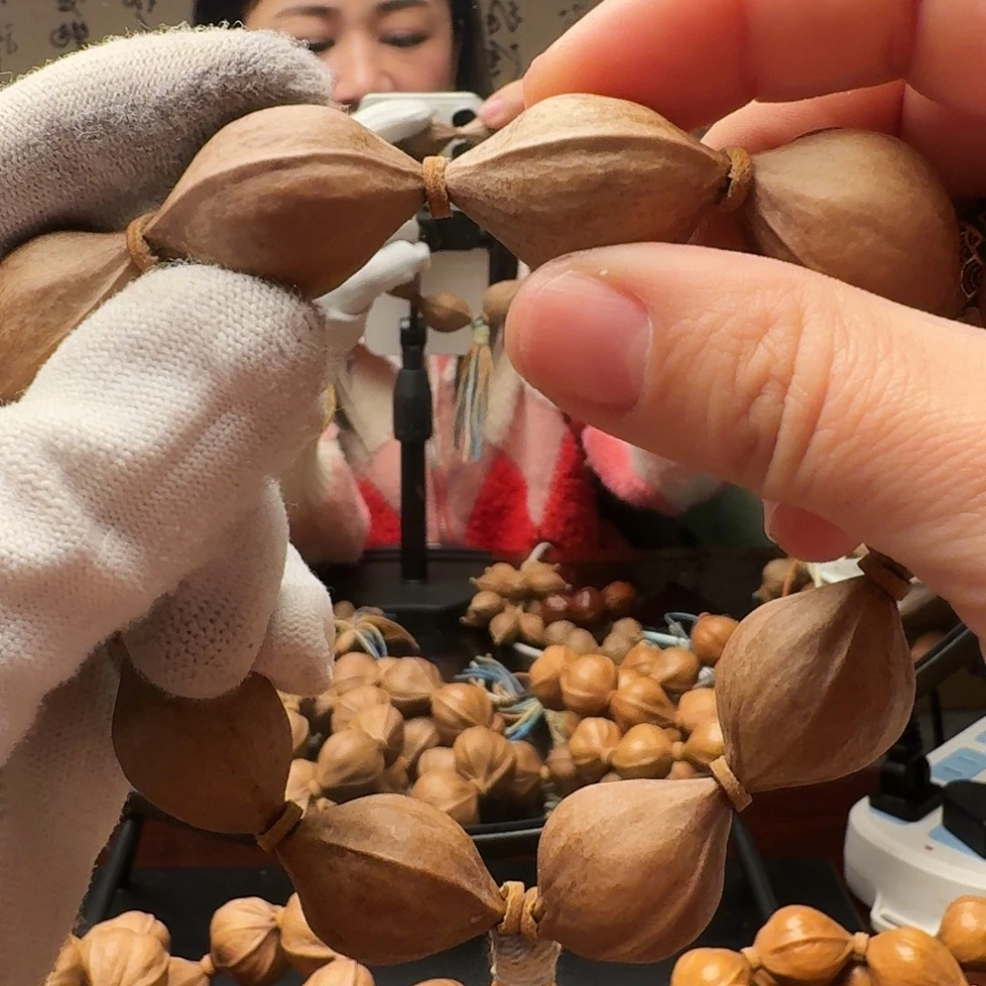 橄榄核把件鲨鱼呗