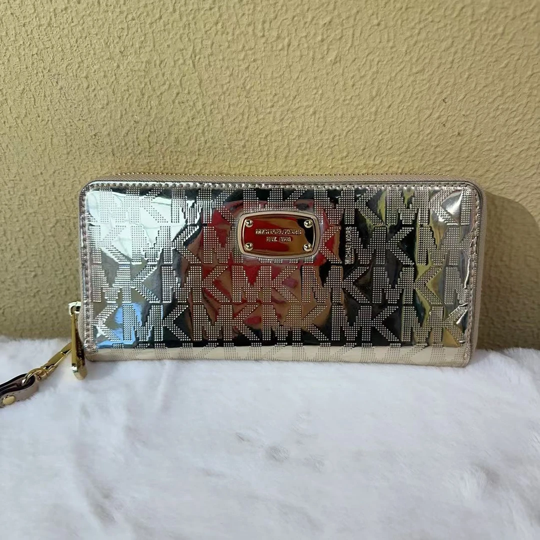 95新  爱包包奢品/MK 手拿包 0205