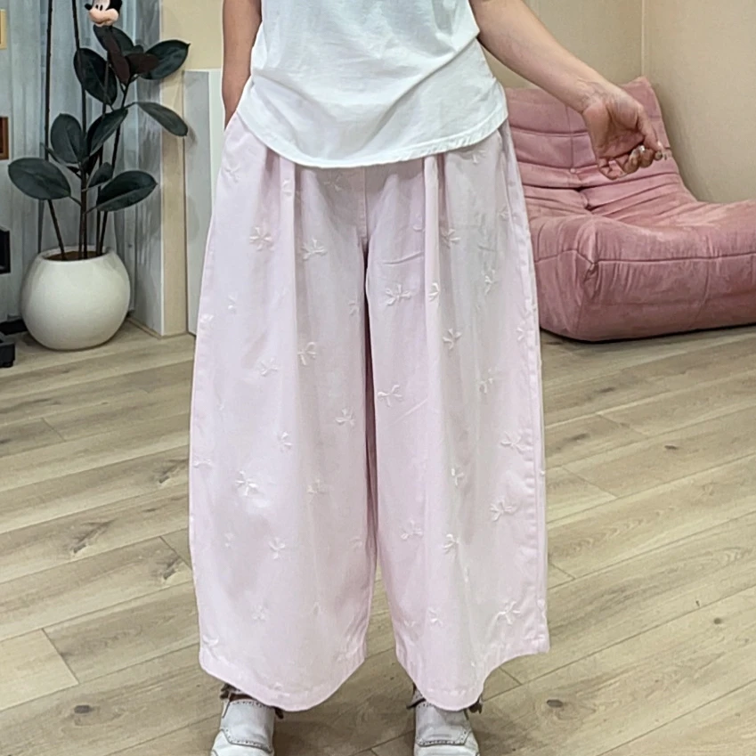 627粉色刺绣蝴蝶结大版休闲八分裤女