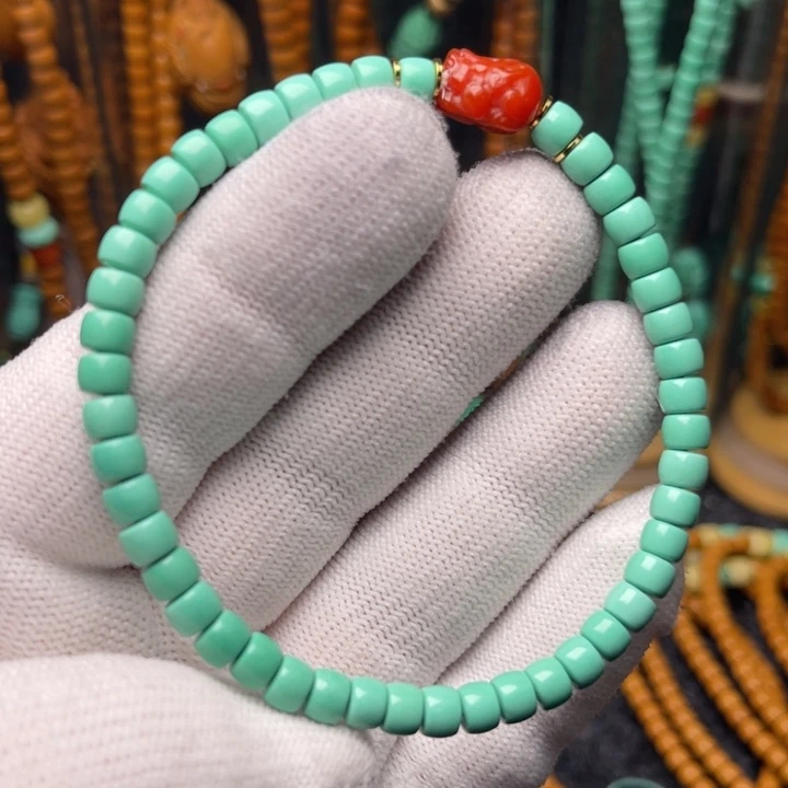 橄榄核吊坠哈哈哈