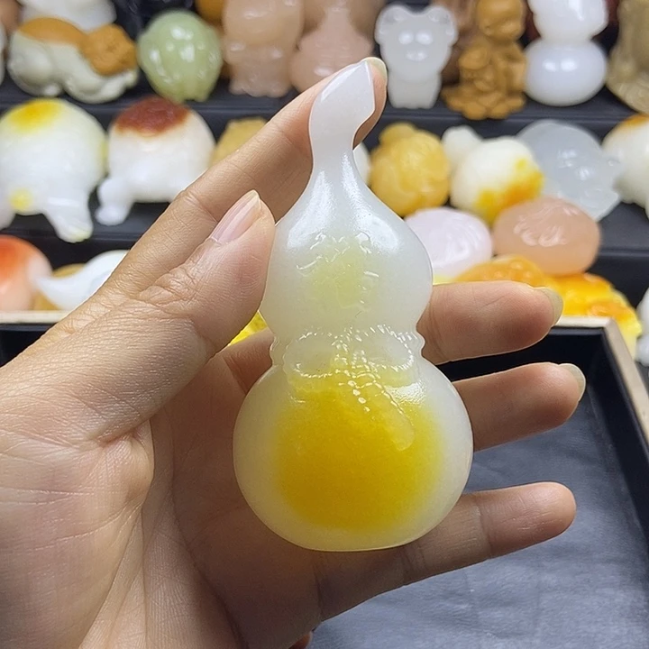 无花朵原石手把件