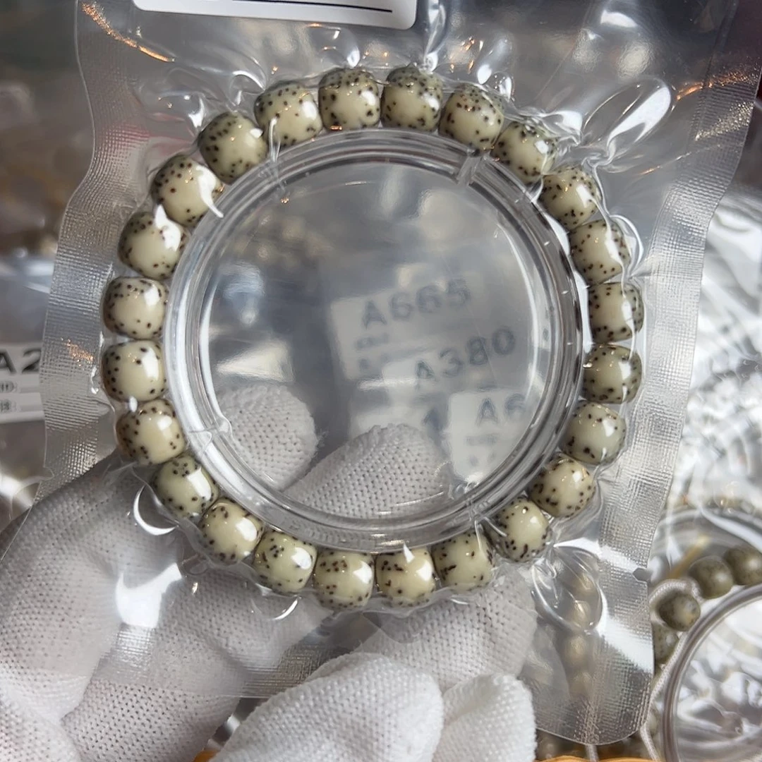 吊坠星月菩提10的石玉料河豚有连星，393