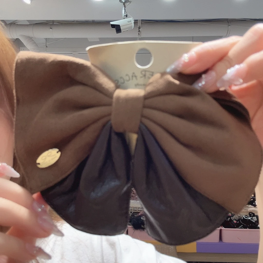 非金属咖色蝴蝶结弹夹