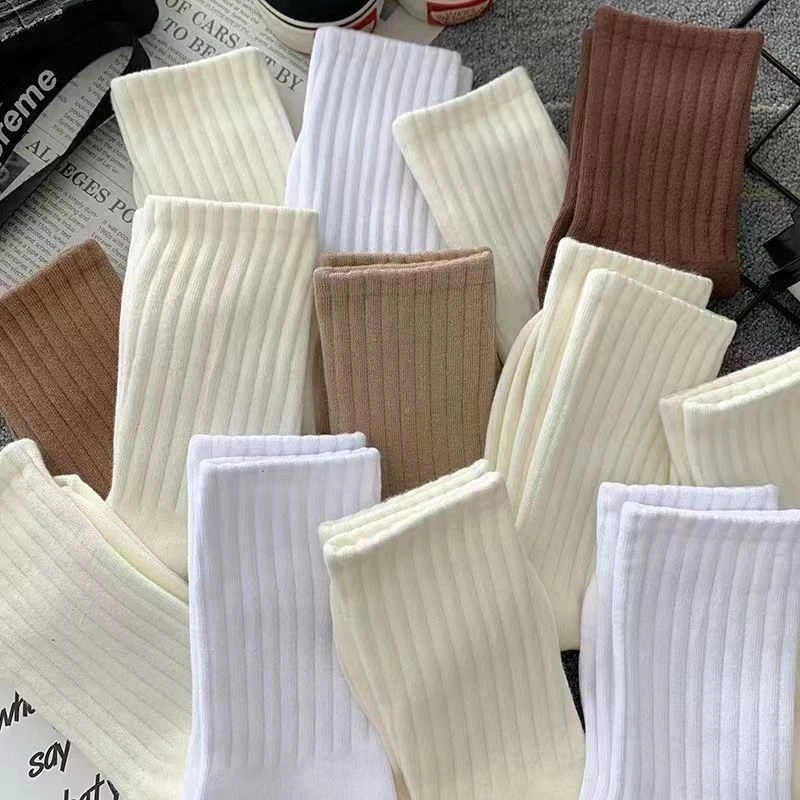 诸暨袜子女款中筒秋冬款ins潮百搭纯色长筒运动情侣长袜女高颜值