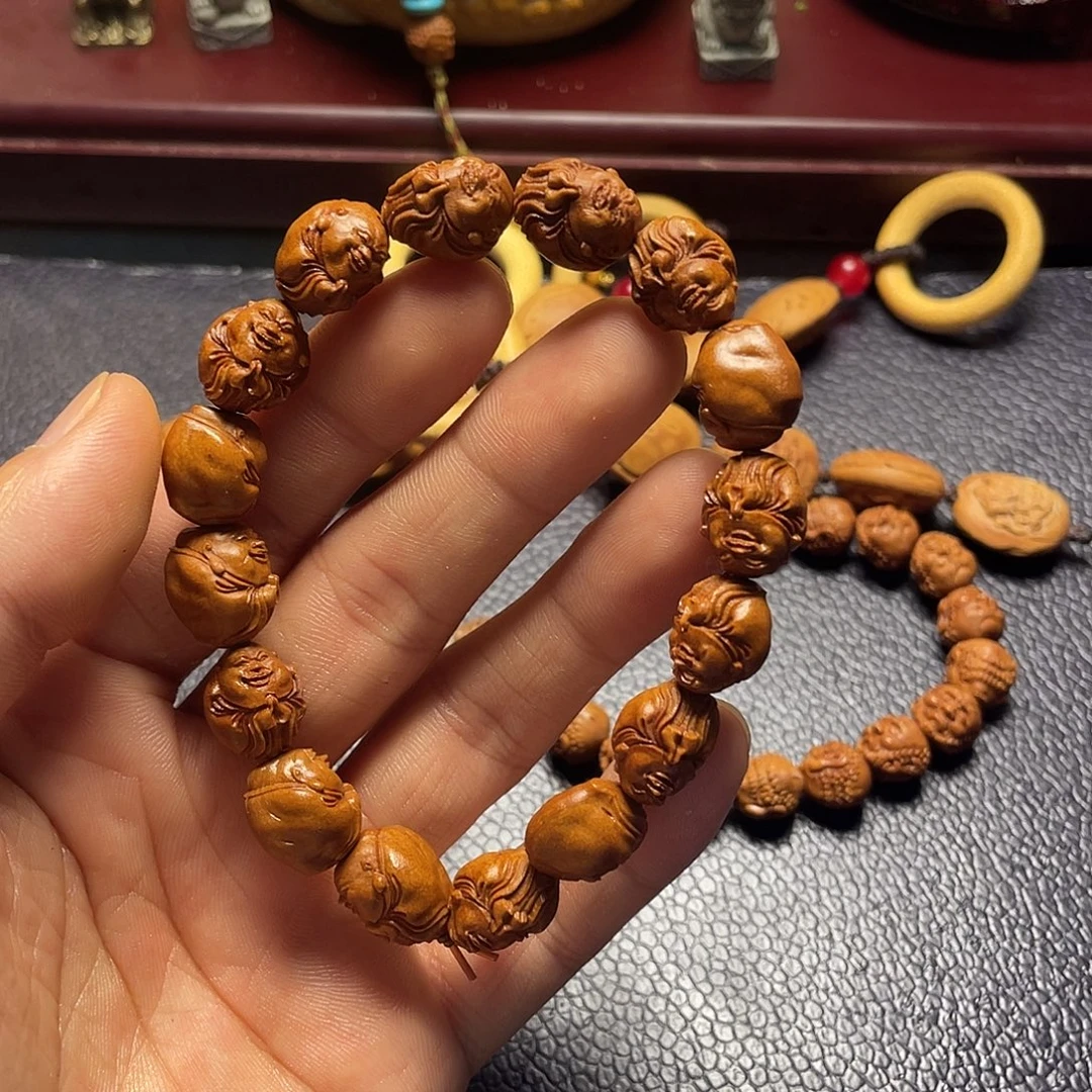 龙纹桃核雕刻瑕疵米勒