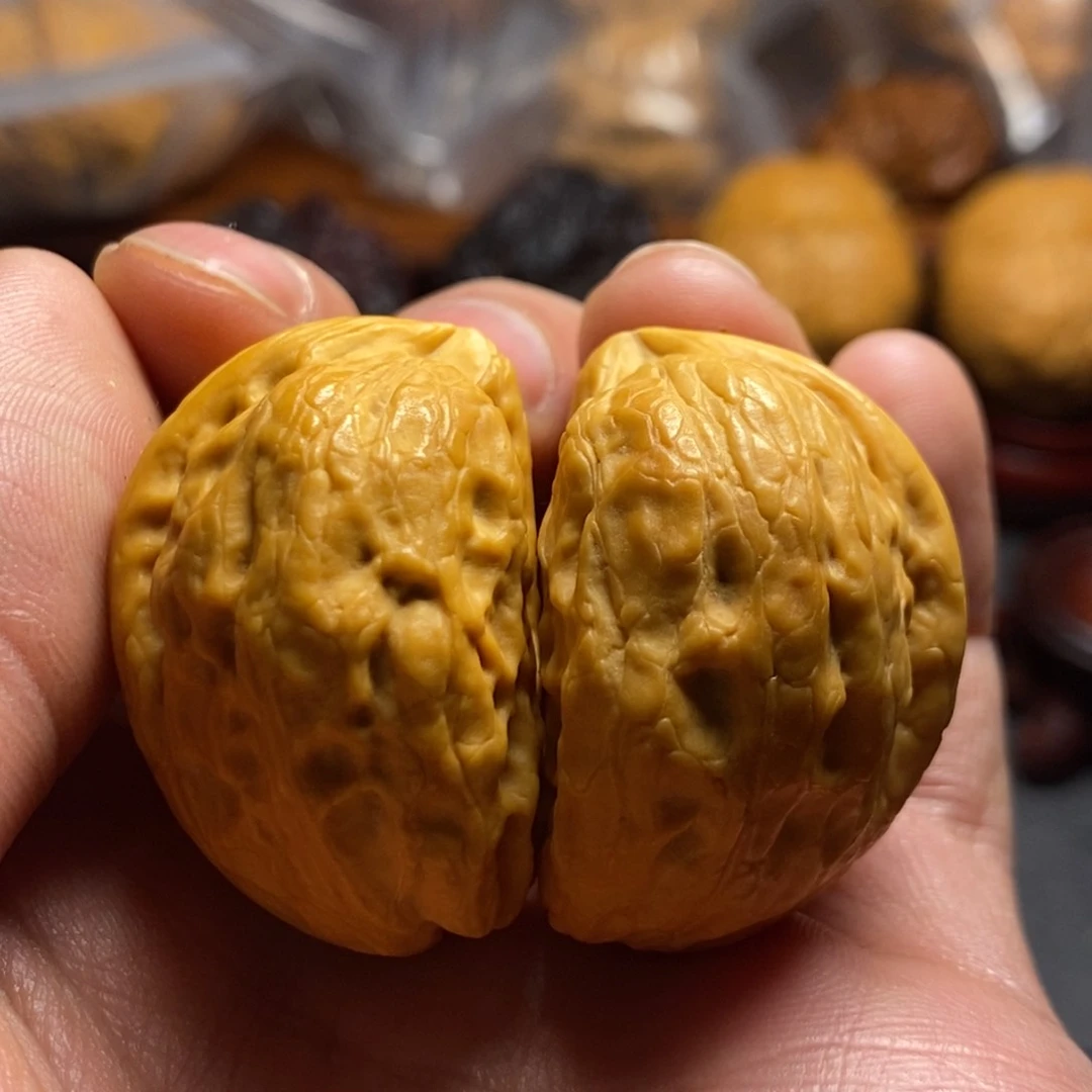文玩核桃把件凭****谓35尺小纽扣