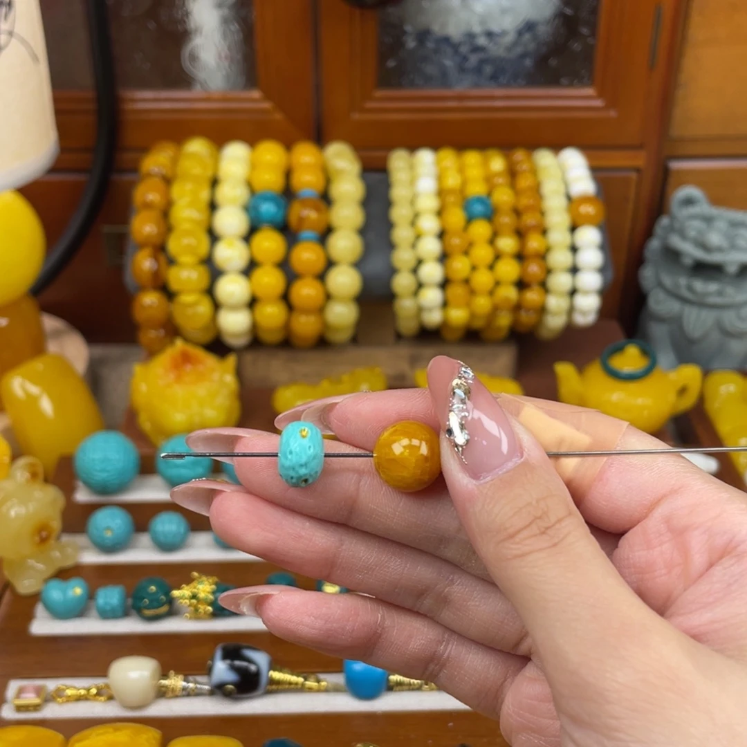 非金属如图两颗松扣子➕圆珠