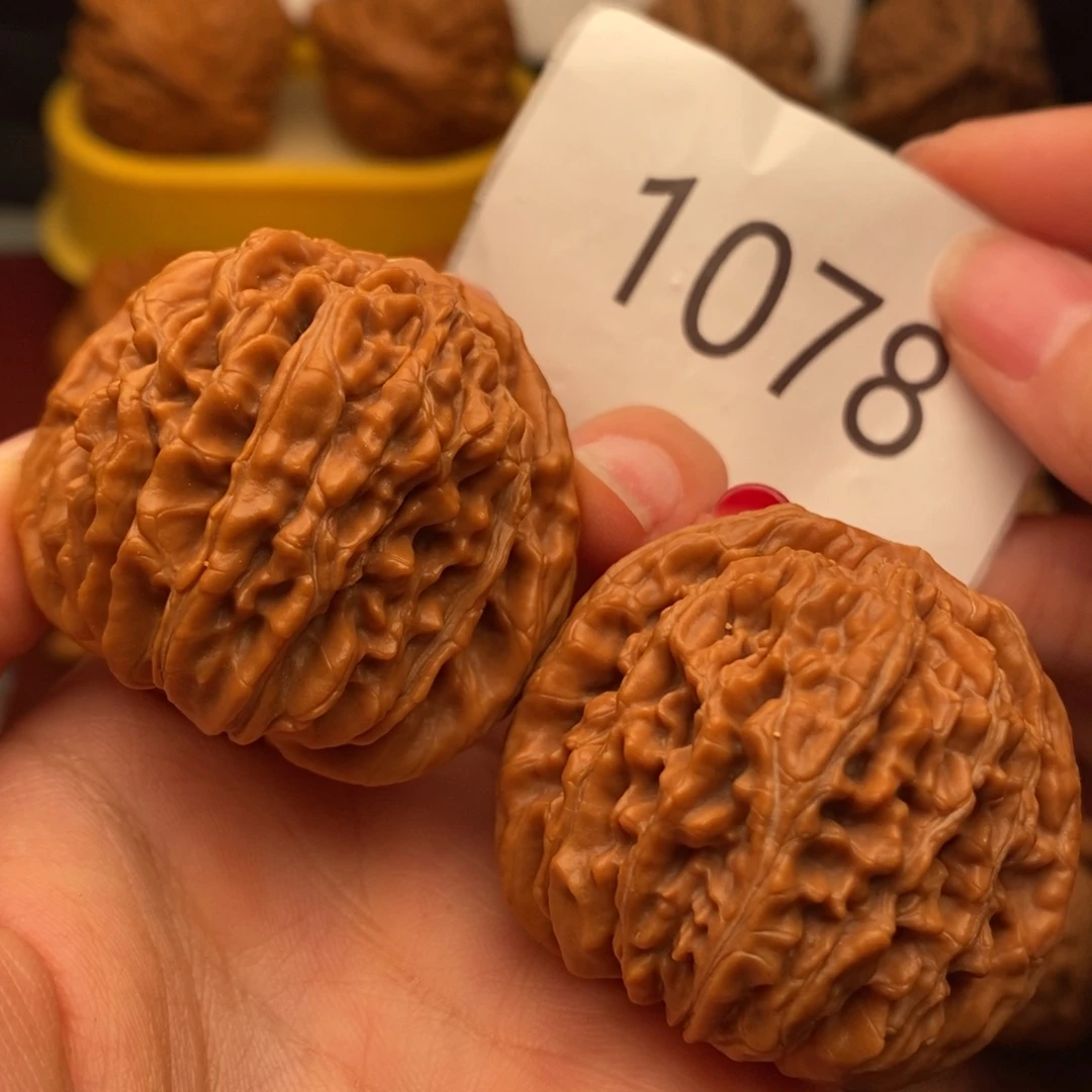 桃核把件汗高楼43……