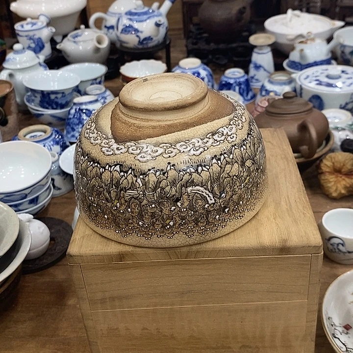 溜***.茶具等产品的生产和销售为