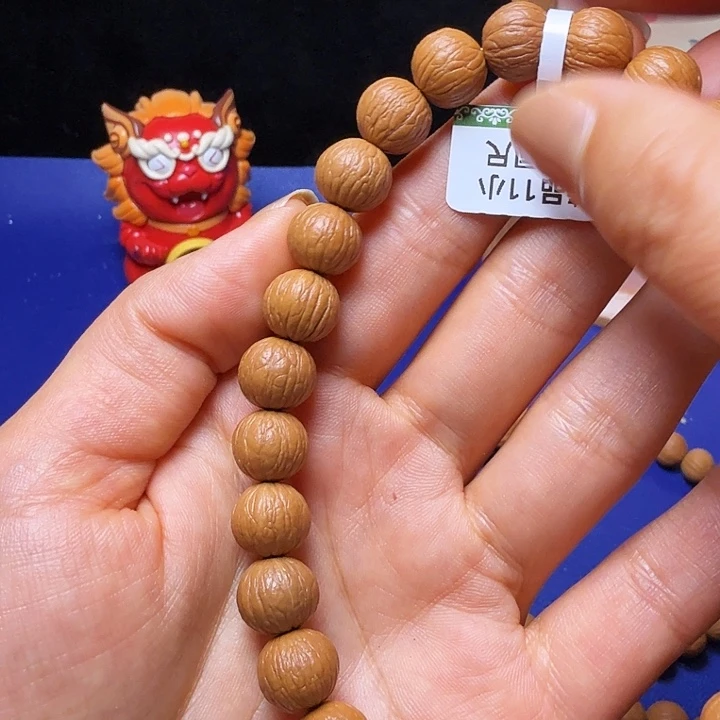 听***风猴头核桃吊坠凤羽