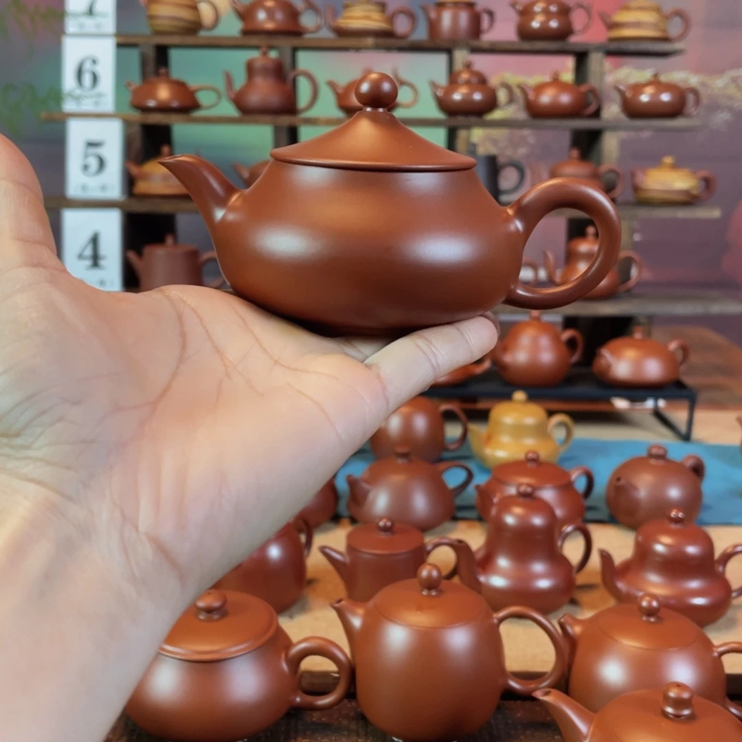 茶壶紫砂似**痕潮州手工手拉朱泥孤舟蓑笠翁