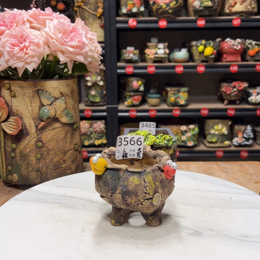 3566 号，雨田花器